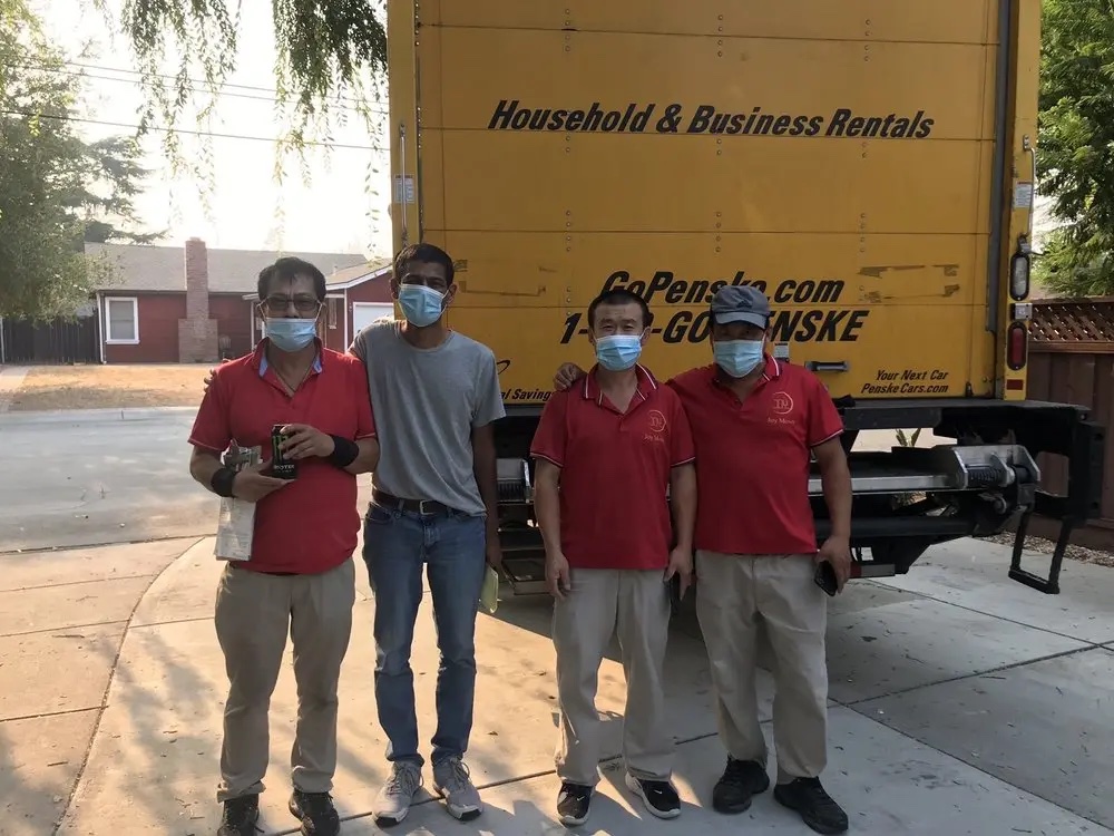 Local moving crew loading furniture for a Bay Area residential move